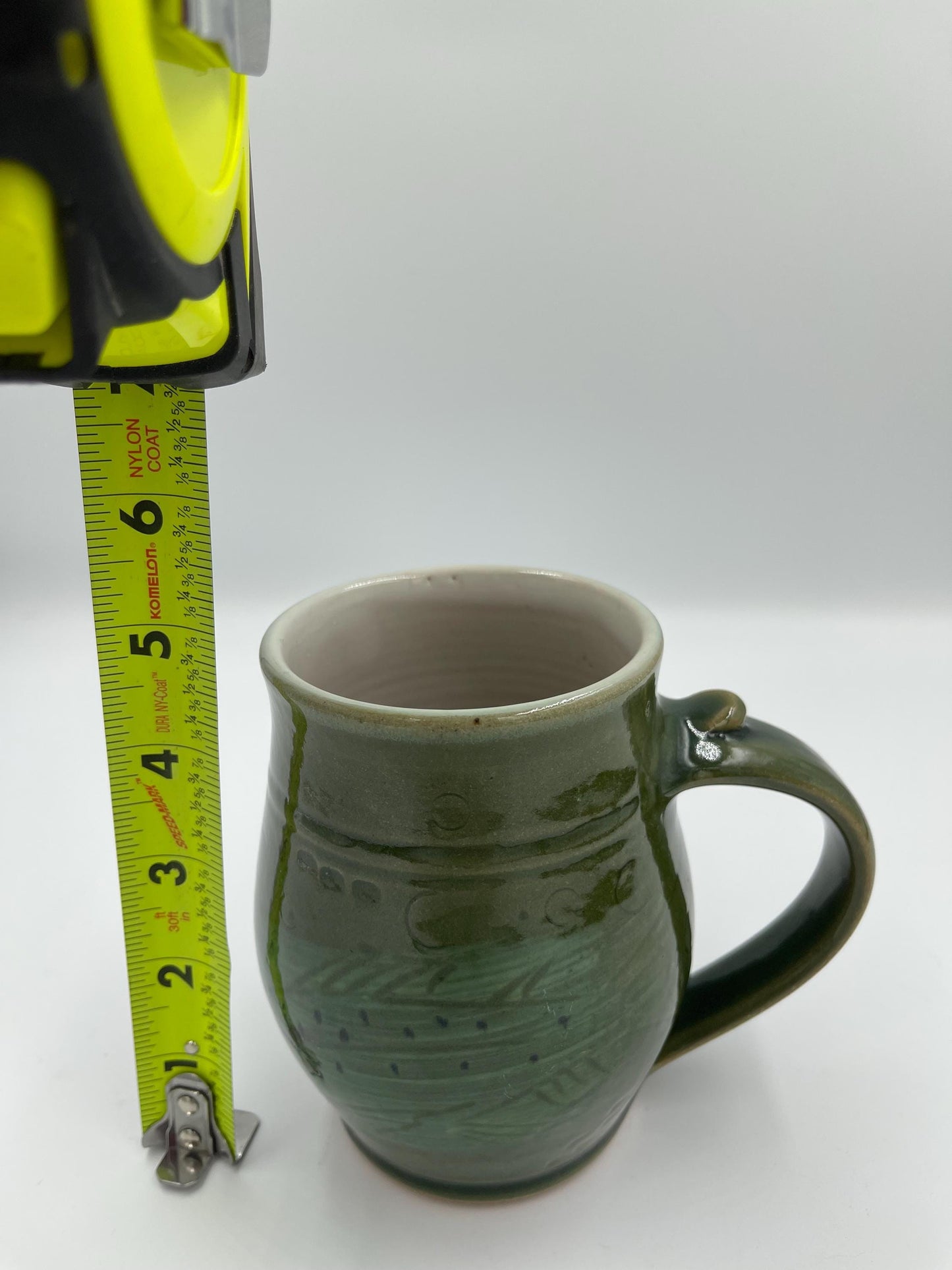 Vintage Handmade Pottery Green Mug with Fish Design