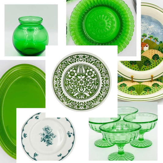 Collection of vintage green dishware including Forest Green glass vase, Fiesta Shamrock platter, and cottage-style dinner plates