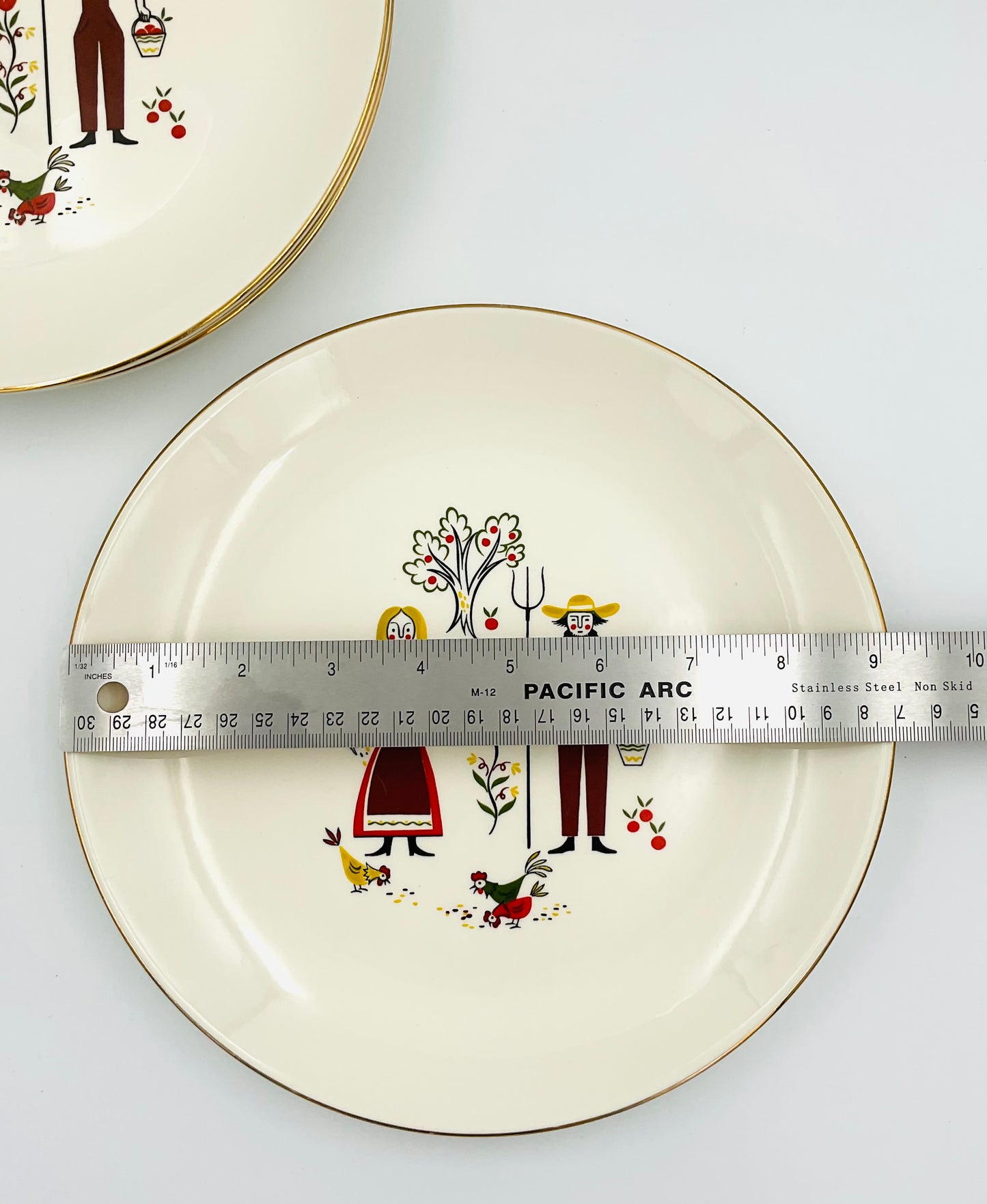 Vintage Homer Laughlin “Rhythm” Folk Art Plates - set of 4