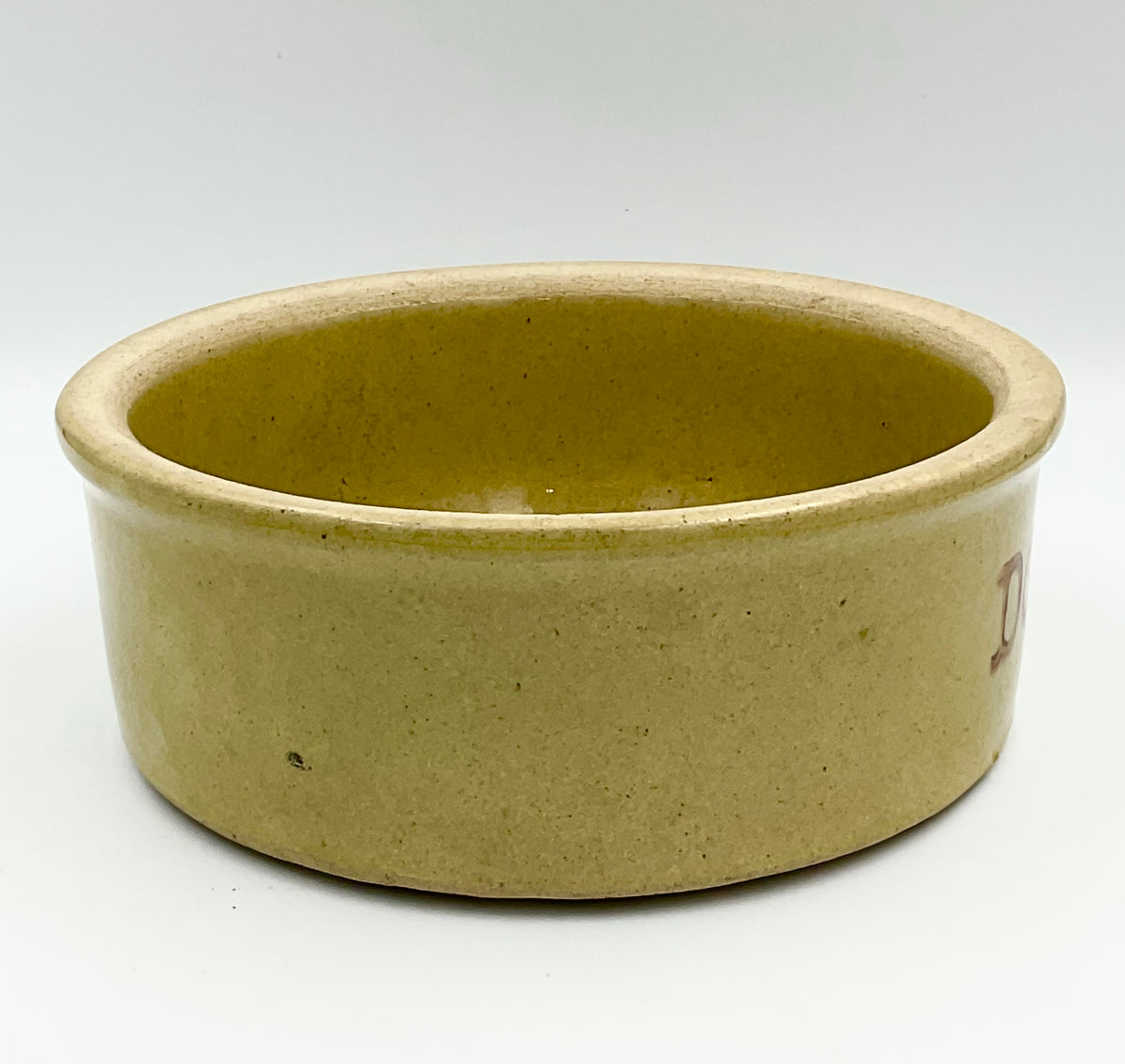 Vintage R.R.P. Co. stoneware dog bowl, side view