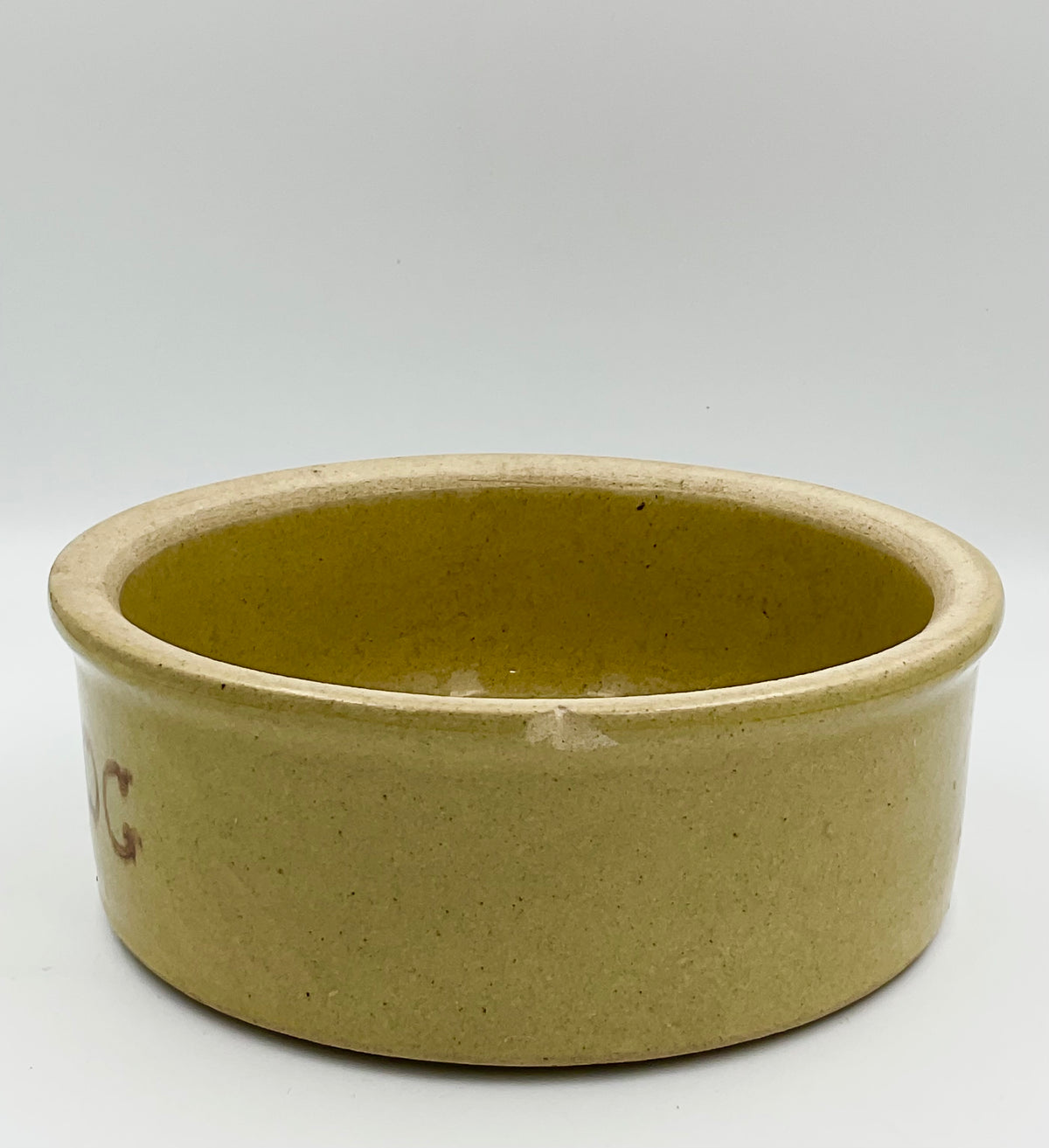Vintage R.R.P. Co. stoneware dog bowl, opposite side view