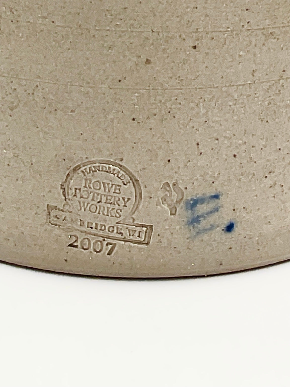 Rowe Pottery Works Cambridge WI stamp dated 2007