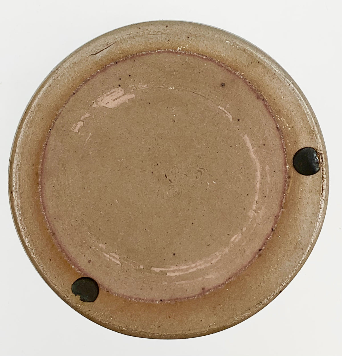 Underside of Rowe vase showing base wear and protective pads