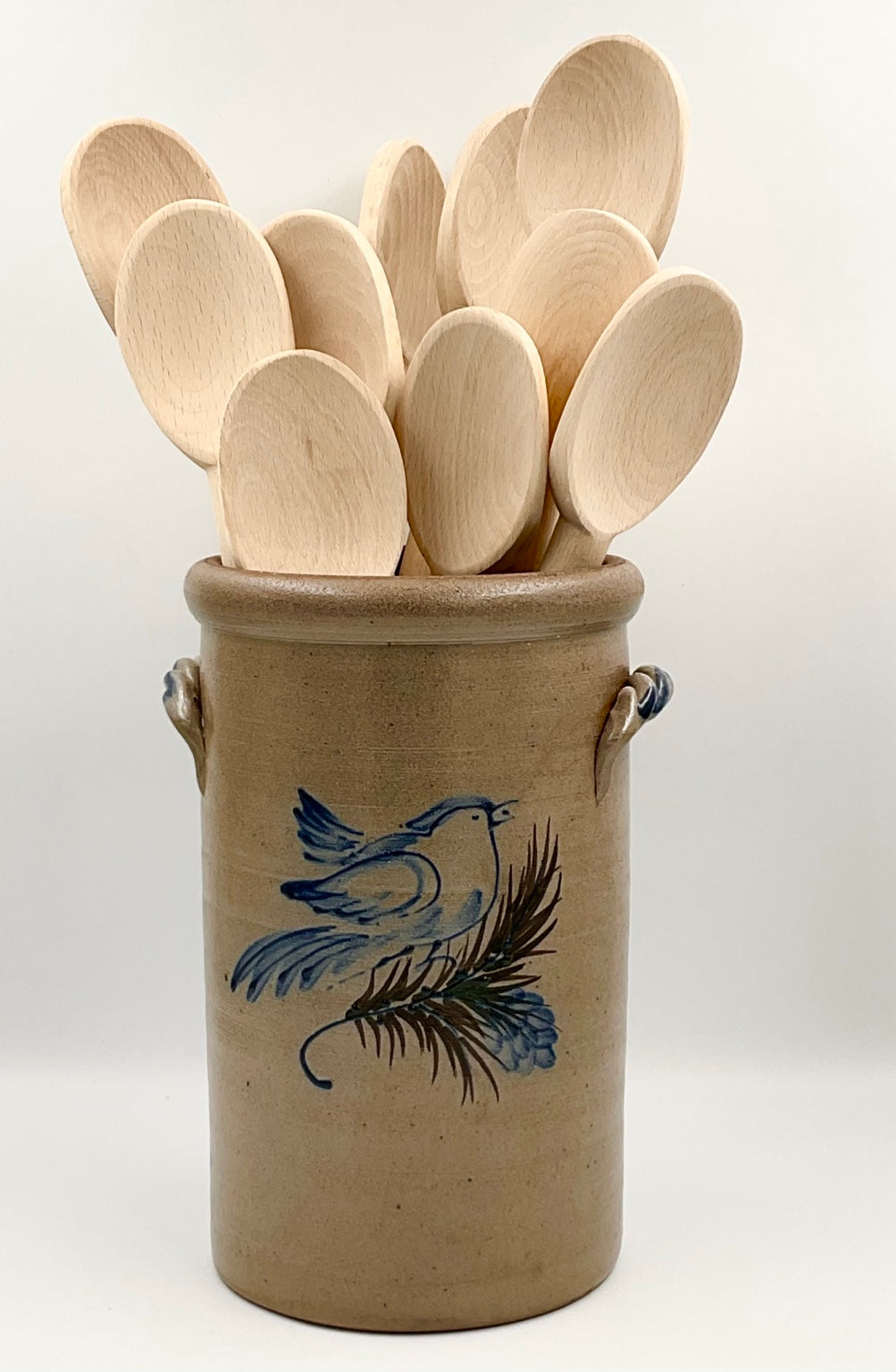 Rowe bird vase styled with wooden spoons, spoons not included