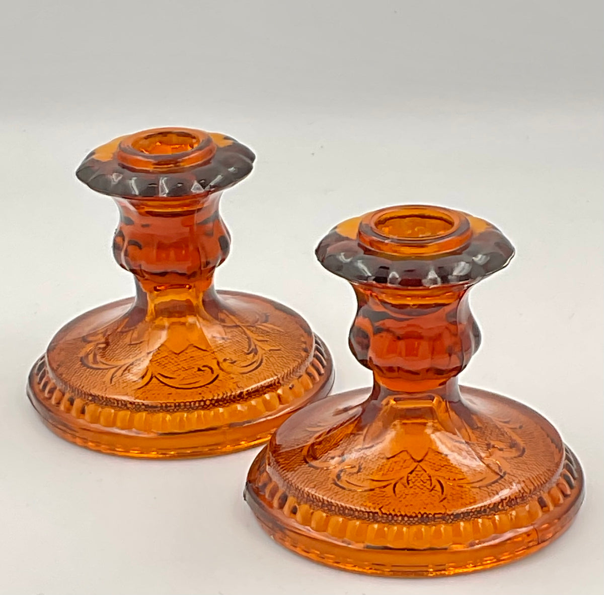 Indiana Glass amber Sandwich candle holders angled view